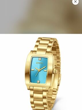 Invicta Gold Tone Watch with Turquoise Dial and Crystal Accents